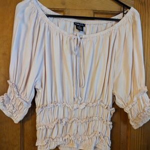 Pink shirt with ruffles